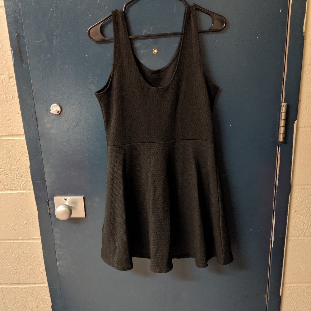 Simple plain black dress.